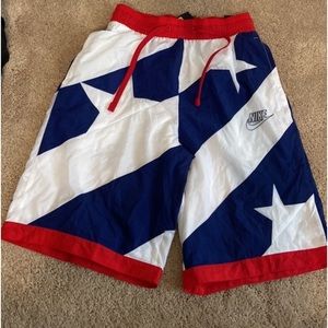 Nike American flag nylon loose fit shorts with net inside.